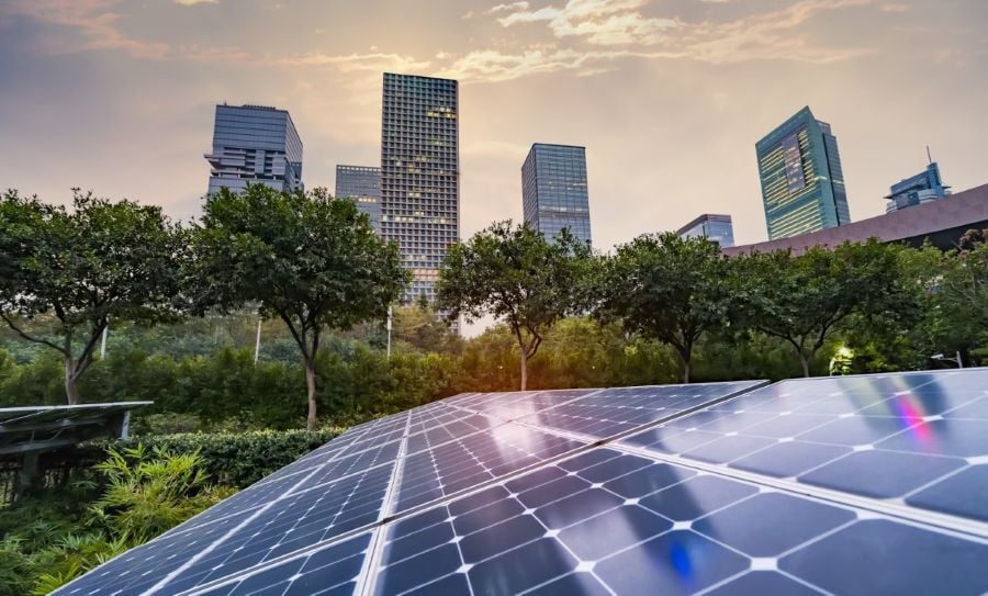 Ecological energy renewable solar panel plant with urban landscape landmarks (1) (Medium)